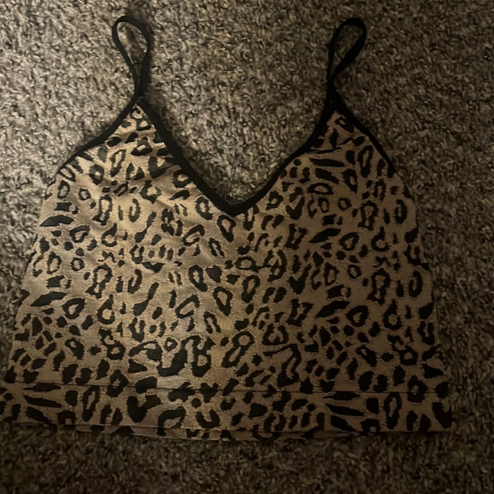 Shein cheetah print top size small worn a few times small rip but not noticeable